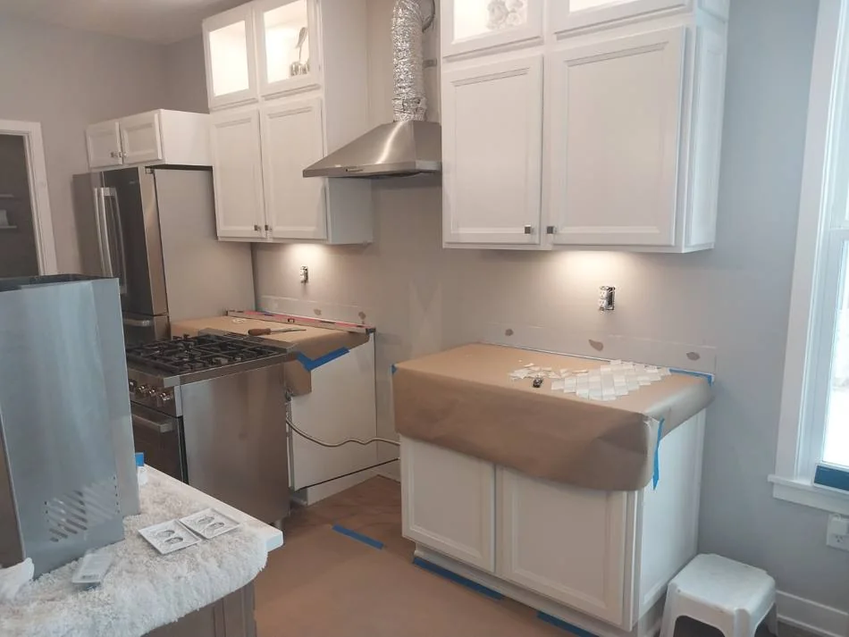 Bathroom before renovation with existing cabinetry and fixtures
