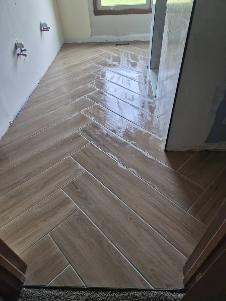 Bathroom floor tile with a geometric layout