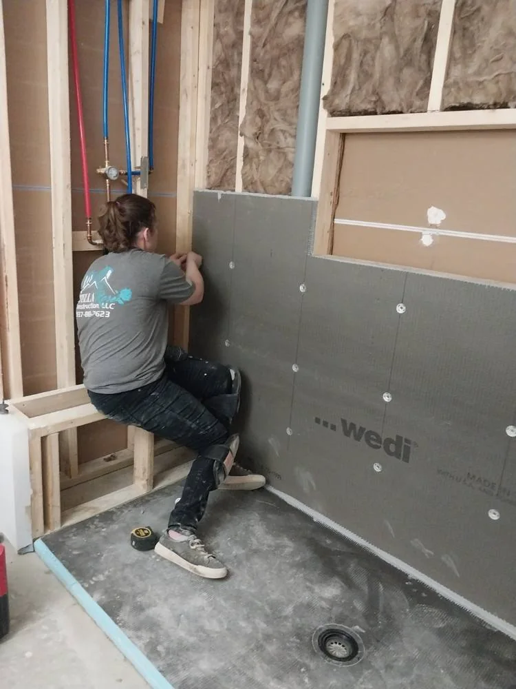 Stella Rose Construction team preparing bathroom walls